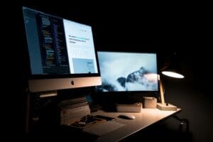 Image of two computers showing off web design in progress